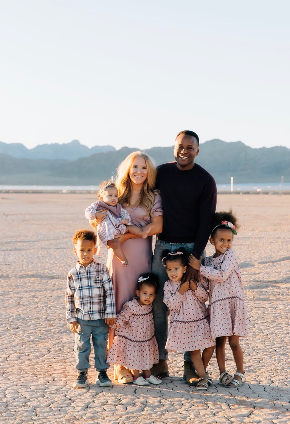 Douglas Nandi, owner of Allure Pools, with his family